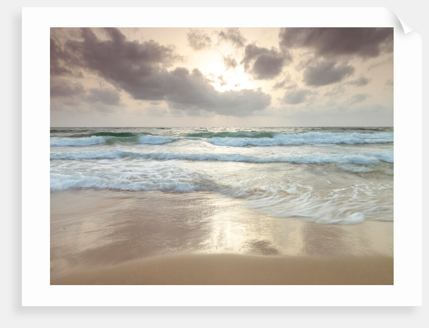 Tranquil beach with cloudscape by Assaf Frank